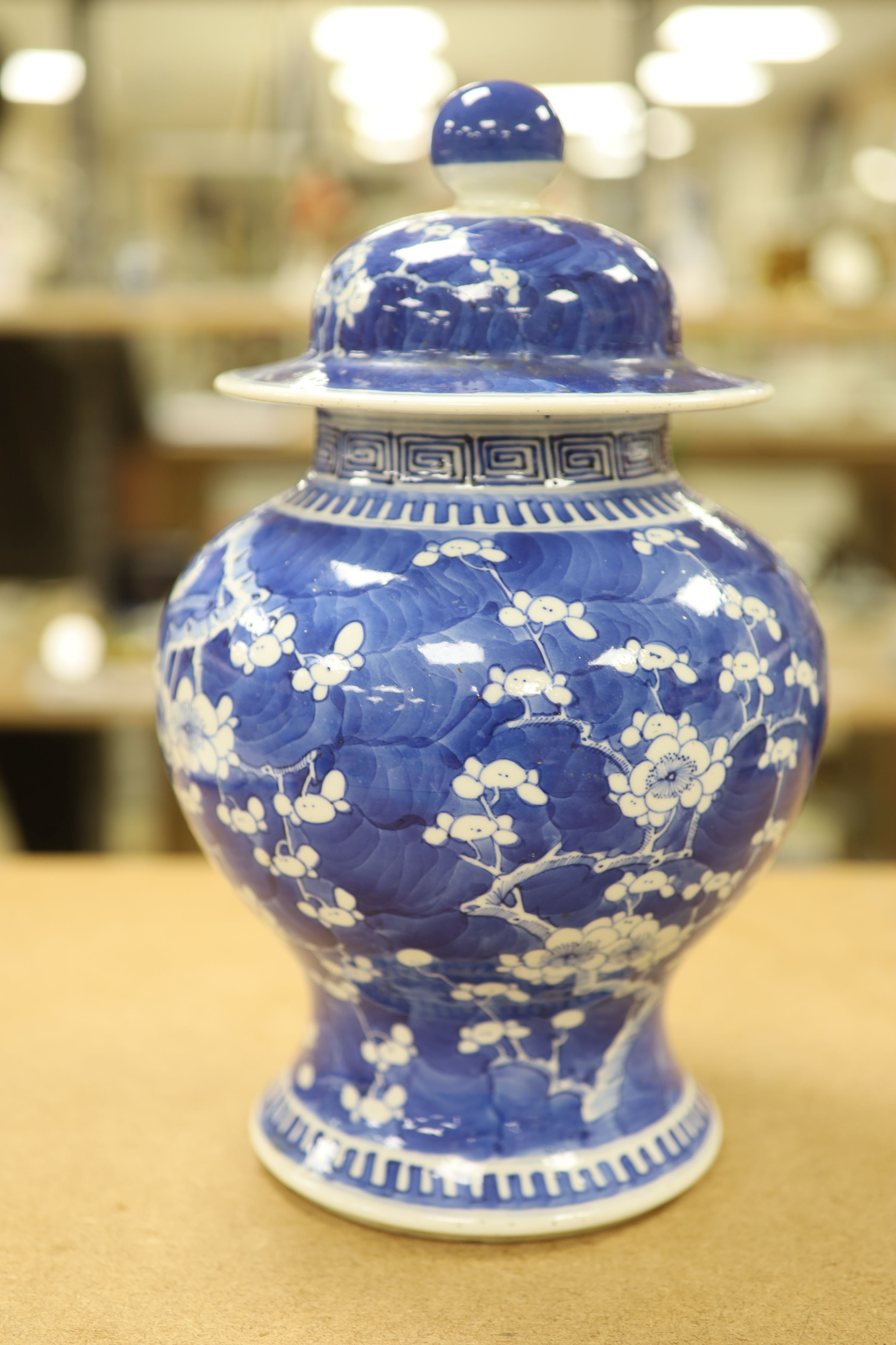 A 19th century Chinese blue and white prunus jar and cover, height, 33cm